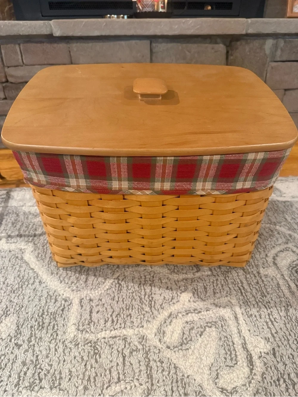 Longaberger newspaper basket. With lid , liner and wrought iron stand